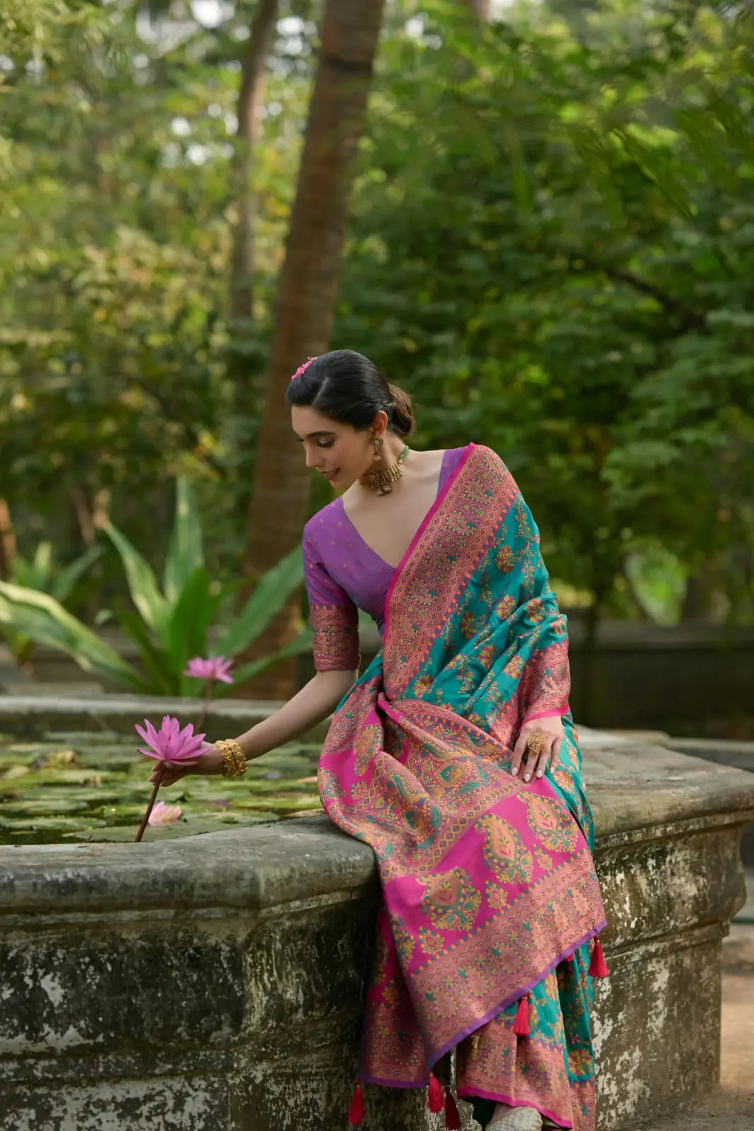 Dark turquoise Zari work soft Pashmina silk saree featuring an intricate Kashmiri-inspired jal weaving pattern, perfect for festive and traditional occasions.